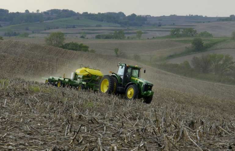 Photo - Field operation - tractor on slope